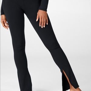 High waisted seamless ribbed flare pant with slit